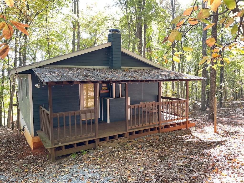 rear view of house with a deck