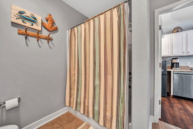 bathroom featuring hardwood / wood-style flooring