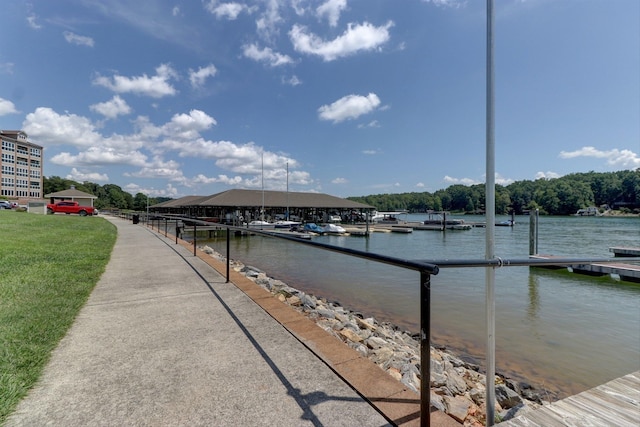 dock area with a water view