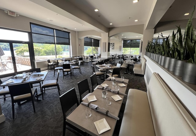 dining space with dark carpet