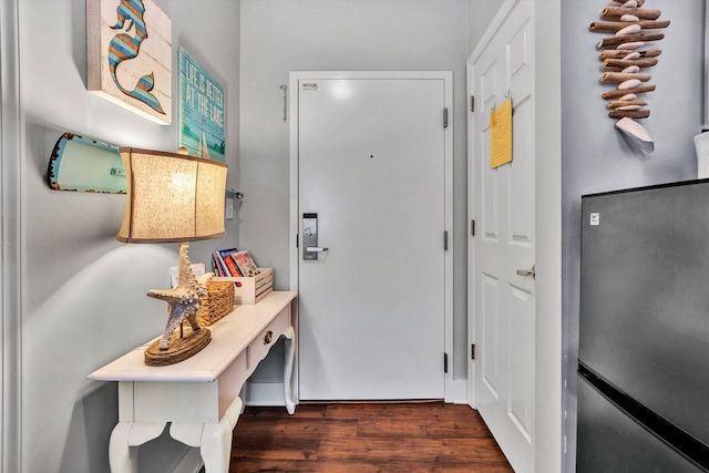 entryway with dark hardwood / wood-style floors