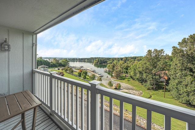 balcony featuring a water view