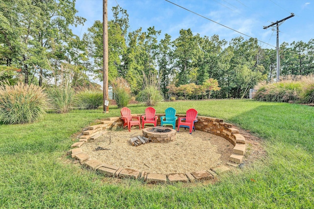 view of yard featuring an outdoor fire pit