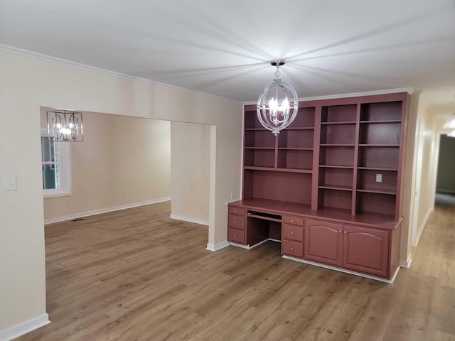 interior space with an inviting chandelier, wood-type flooring, and crown molding