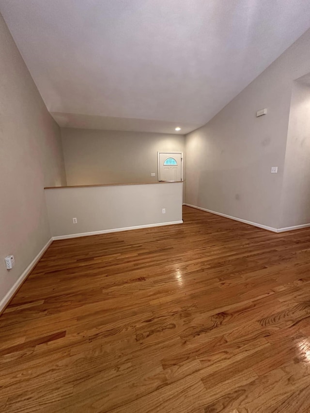 unfurnished room featuring hardwood / wood-style floors