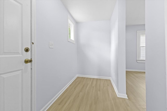 interior space with light hardwood / wood-style flooring and plenty of natural light