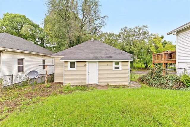 view of outbuilding featuring a yard