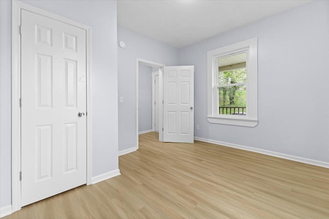 unfurnished bedroom with light hardwood / wood-style flooring