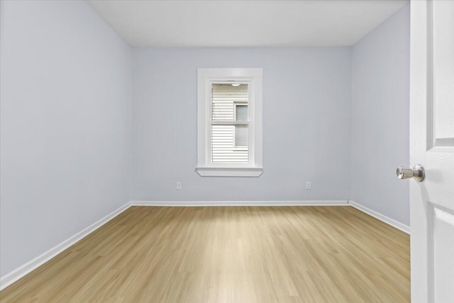 empty room with light wood-type flooring