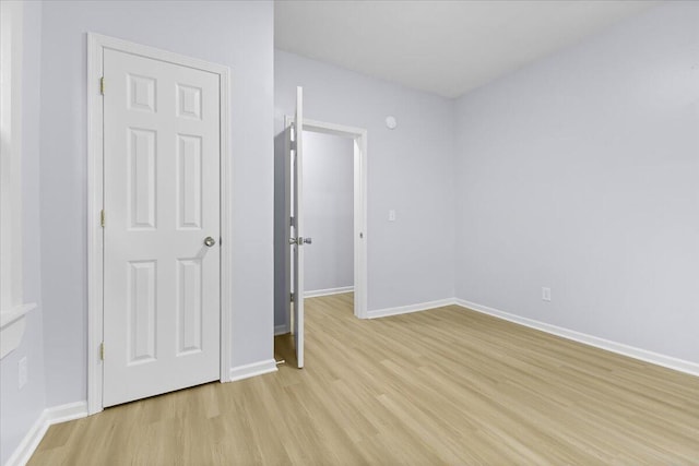 unfurnished bedroom featuring light hardwood / wood-style floors