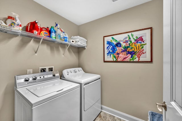 laundry area with washer and dryer