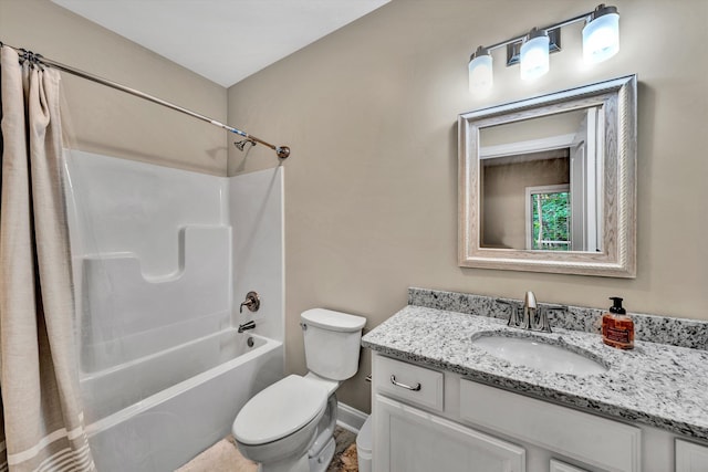 full bathroom featuring vanity, shower / tub combo, and toilet