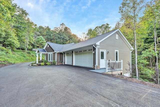 single story home featuring a garage