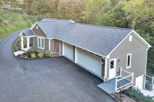 view of front of home featuring central air condition unit