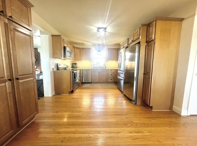 dining room featuring plenty of natural light and dark hardwood / wood-style flooring