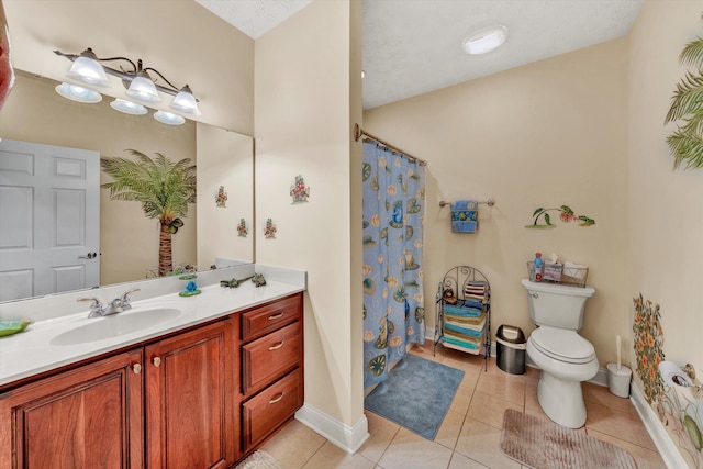 bathroom featuring vanity, curtained shower, a textured ceiling, tile patterned floors, and toilet