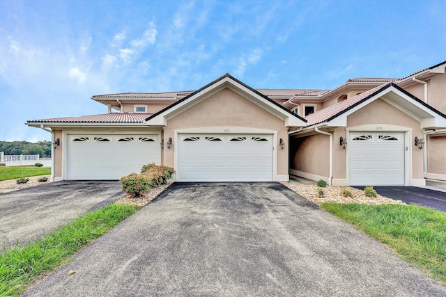 single story home featuring a garage