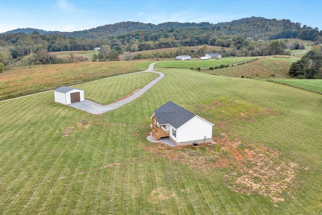 aerial view featuring a mountain view and a rural view