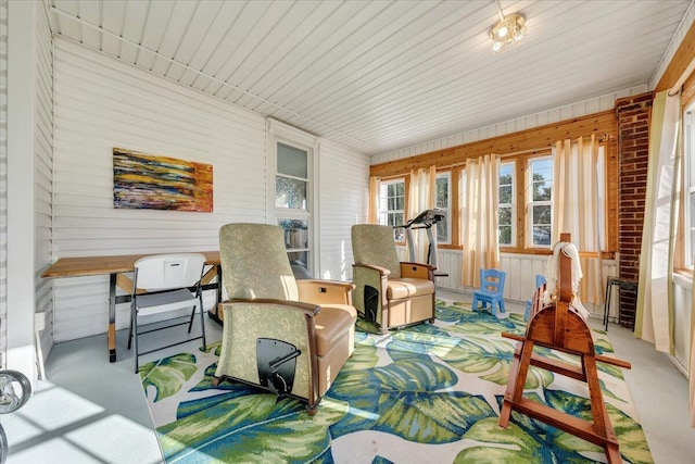 sunroom / solarium with wood ceiling