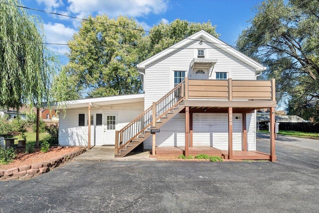 view of front of home with a wooden deck