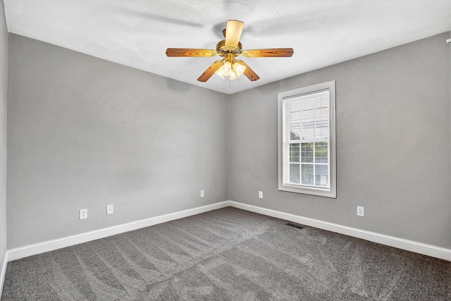 empty room with carpet floors and ceiling fan