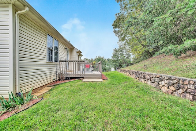 view of yard featuring a deck