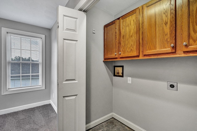 laundry room with cabinets and hookup for an electric dryer