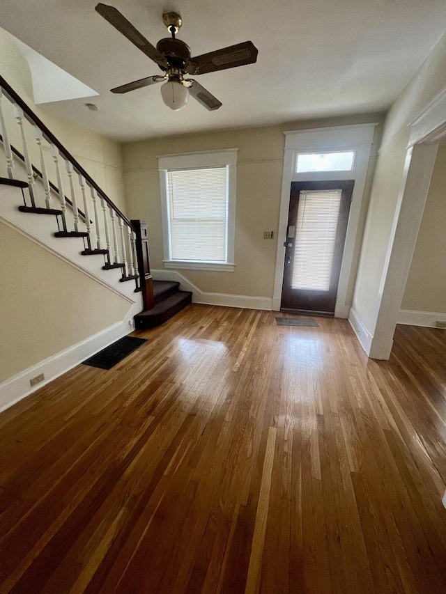 entrance foyer with ceiling fan and hardwood / wood-style floors