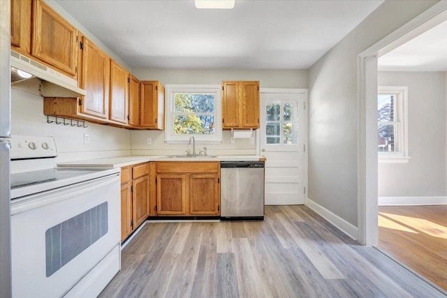 kitchen with white electric range oven, sink, dishwasher, and light hardwood / wood-style flooring