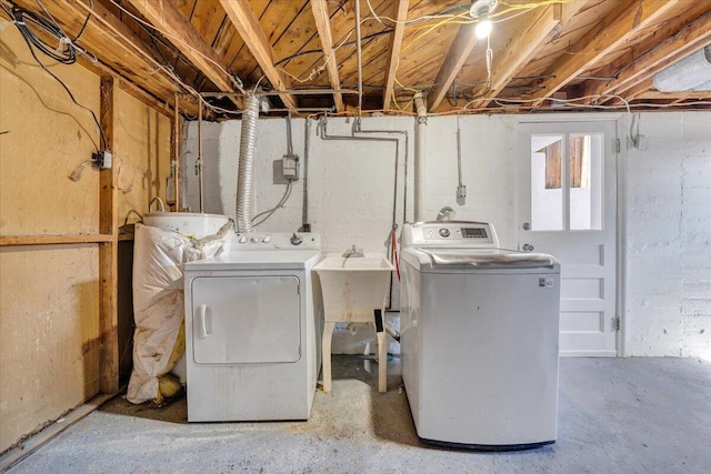 laundry room with separate washer and dryer