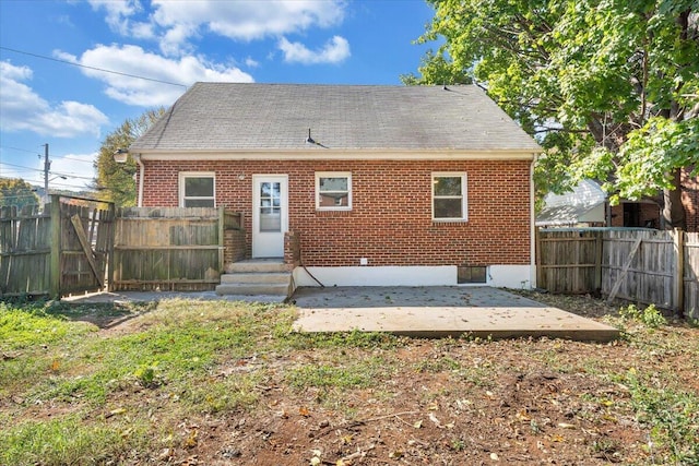 back of house with a patio area