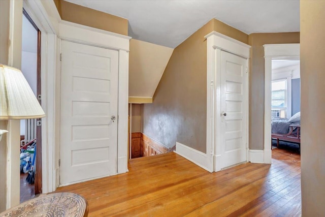 hallway featuring hardwood / wood-style flooring