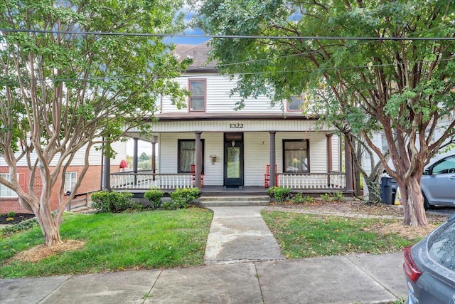 view of front of property featuring covered porch