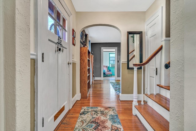 entryway with light hardwood / wood-style flooring