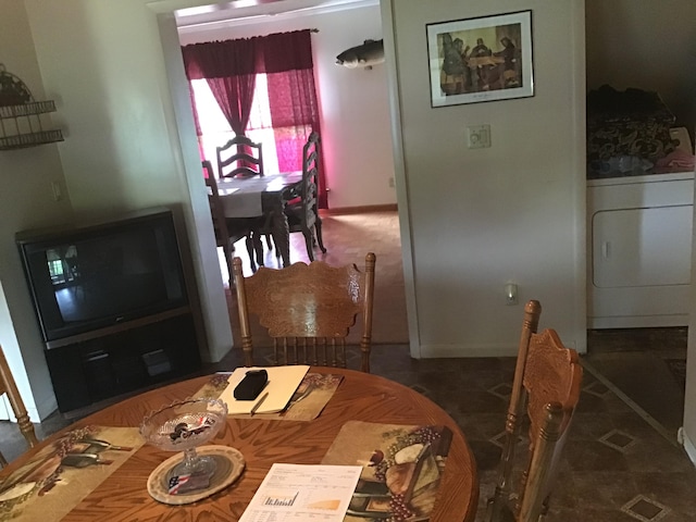 dining room featuring washer / clothes dryer