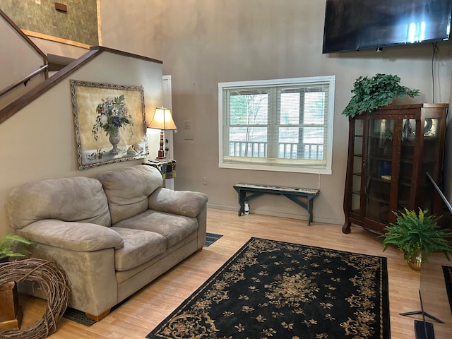 living room with light hardwood / wood-style flooring