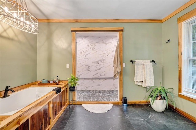 bathroom with crown molding and a tub to relax in