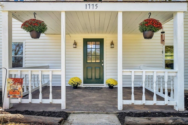 entrance to property with covered porch