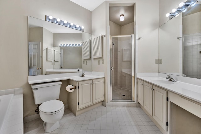 bathroom featuring tile patterned flooring, vanity, toilet, and an enclosed shower