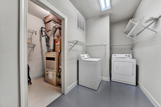 laundry area featuring separate washer and dryer