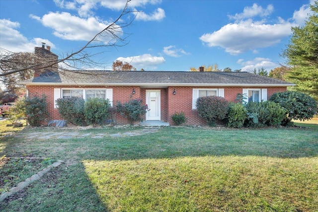 ranch-style home with a front yard