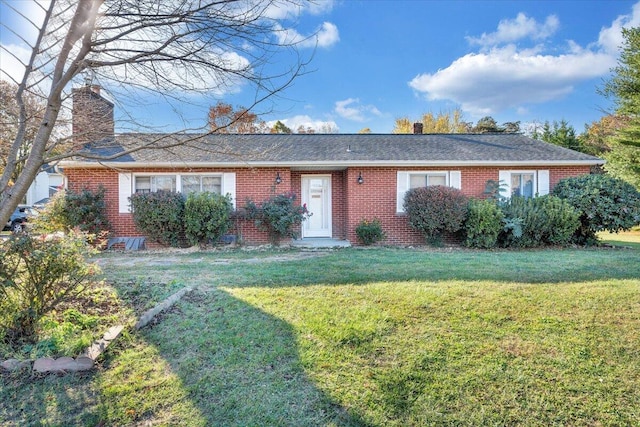 ranch-style house with a front yard