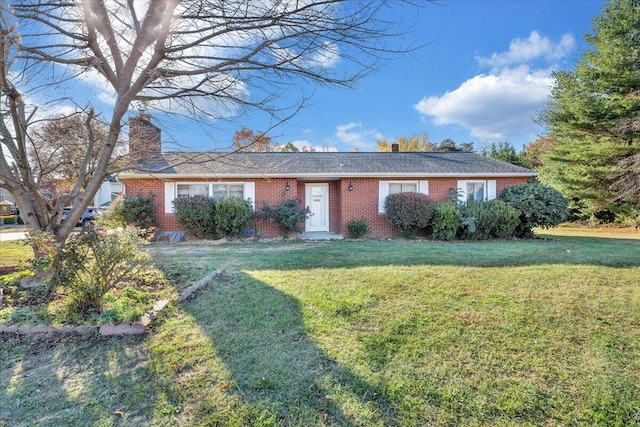 ranch-style home with a front yard