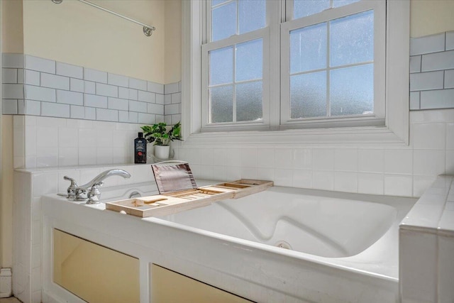 bathroom with a tub