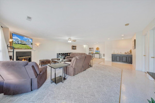 living room featuring ceiling fan