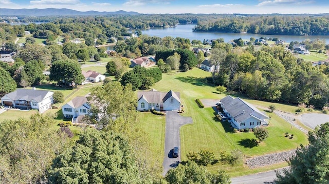 bird's eye view featuring a water and mountain view