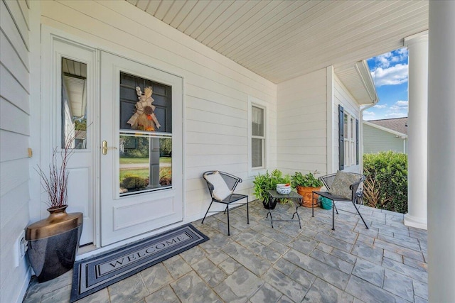 property entrance with a porch