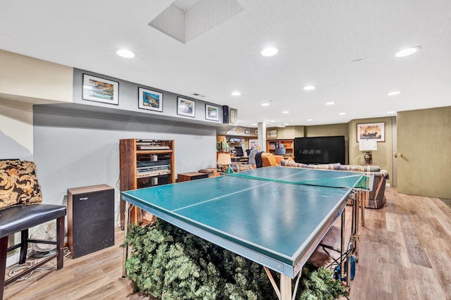 game room featuring light wood-type flooring