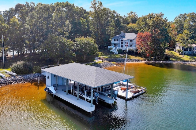 dock area featuring a water view