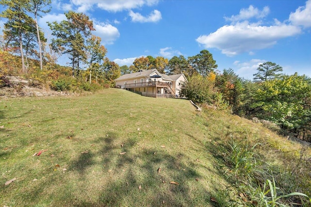 view of yard featuring a wooden deck